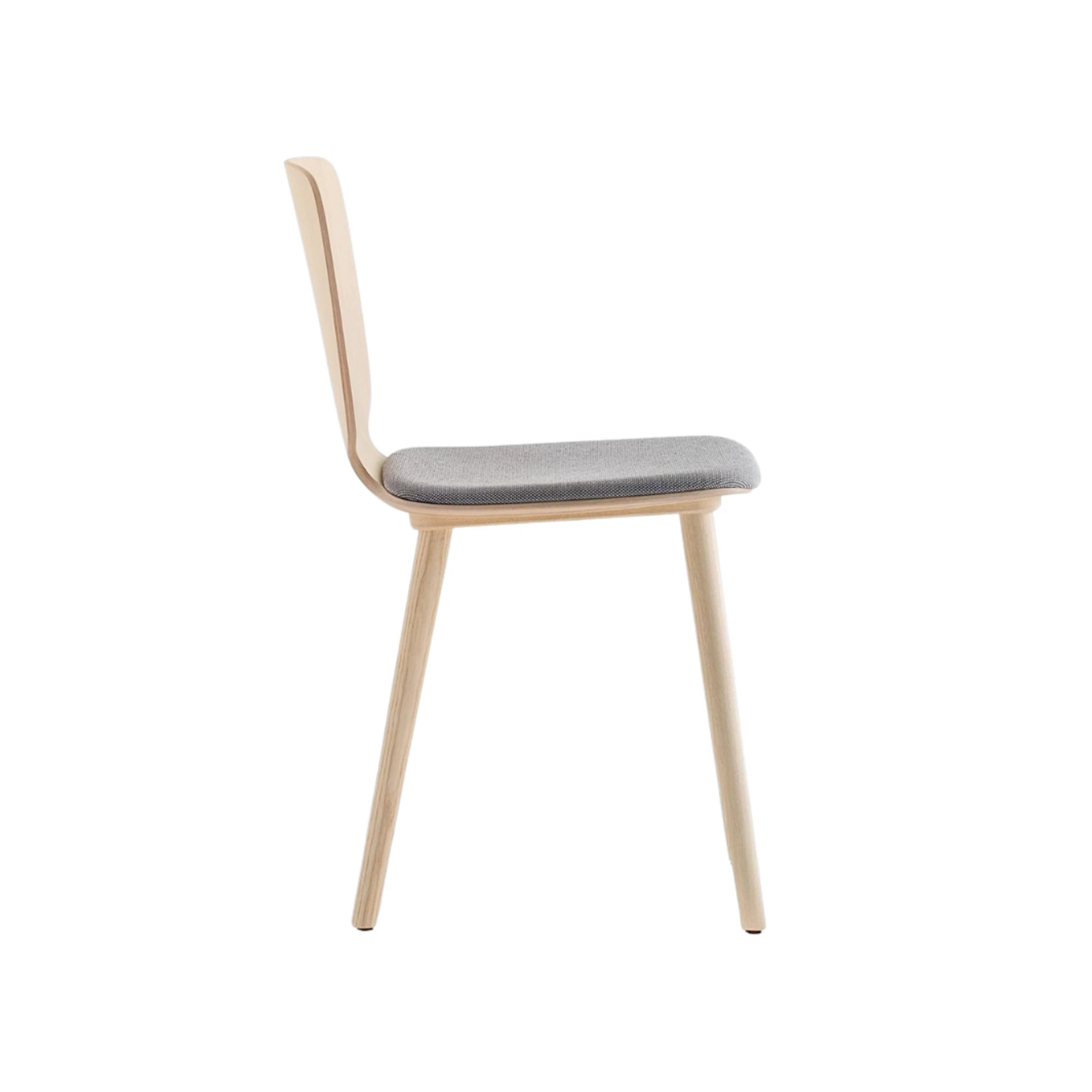Chair featuring a curved ash plywood shell in variable thickness and solid ash wood legs for a warm, natural look. Available in a range of contemporary finishes: blue, azur, dark green, mint green, red, pink, dark brown, and brown. A stylish and comfortable choice for hospitality interiors.